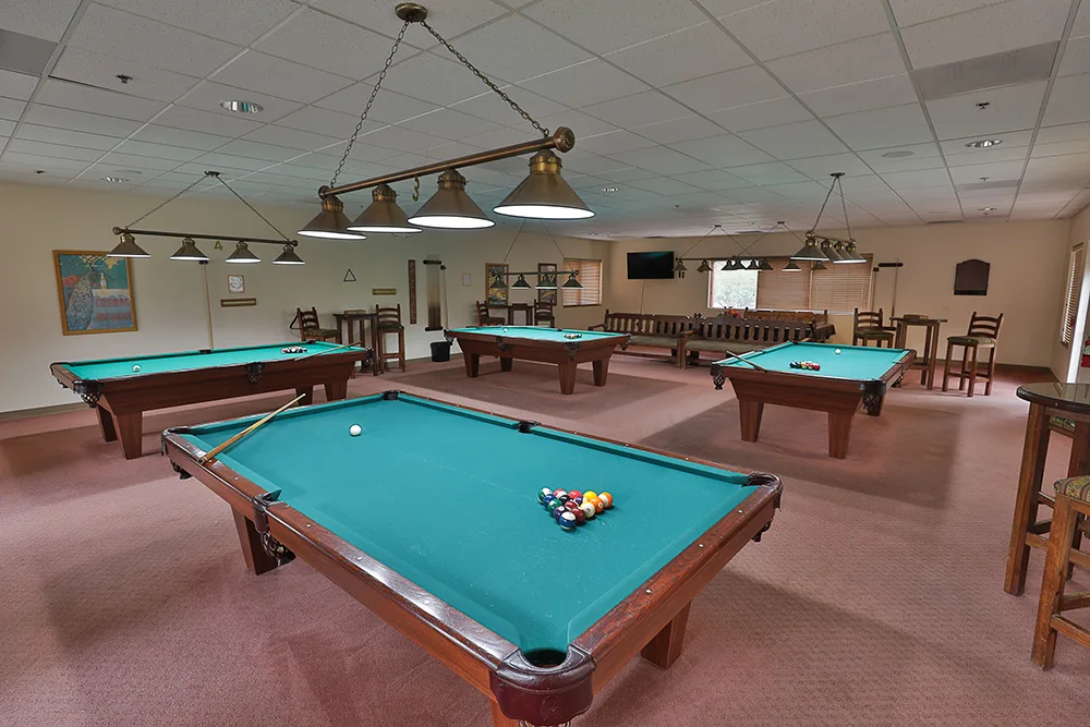 billiard tables in a clubhouse